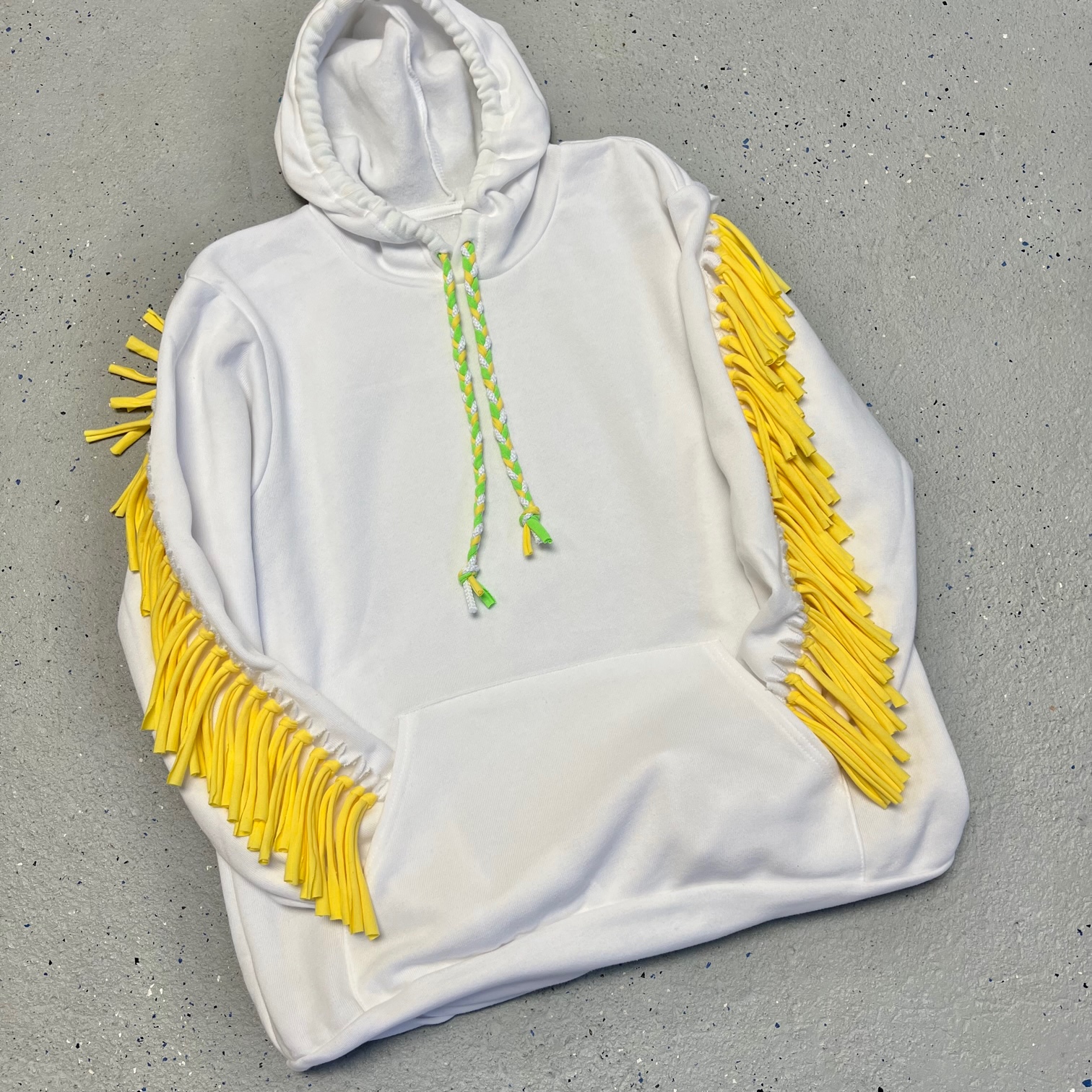 white hoodie with fringe